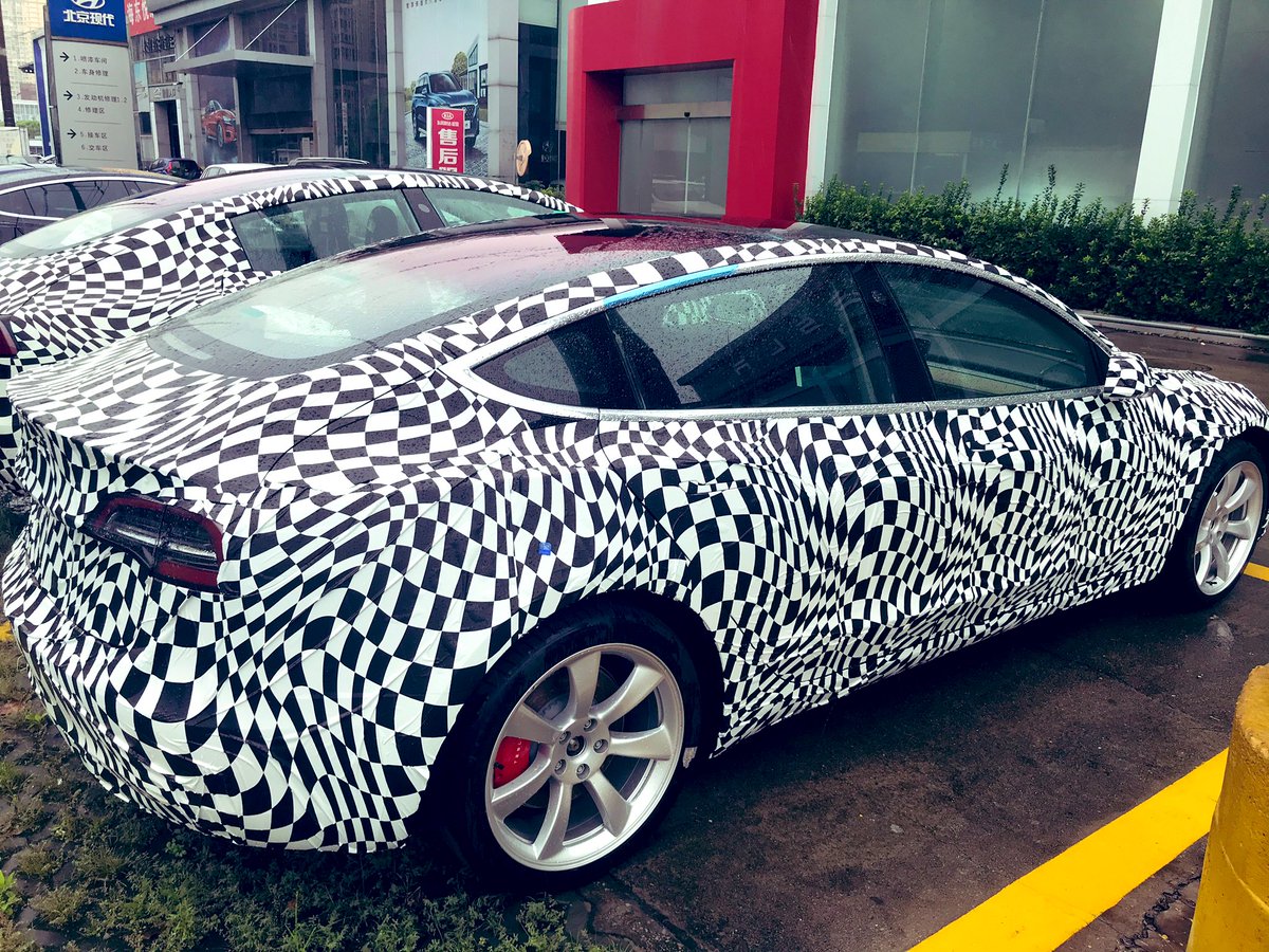 Jason Man On Twitter Camouflage Model 3 Parked Outside