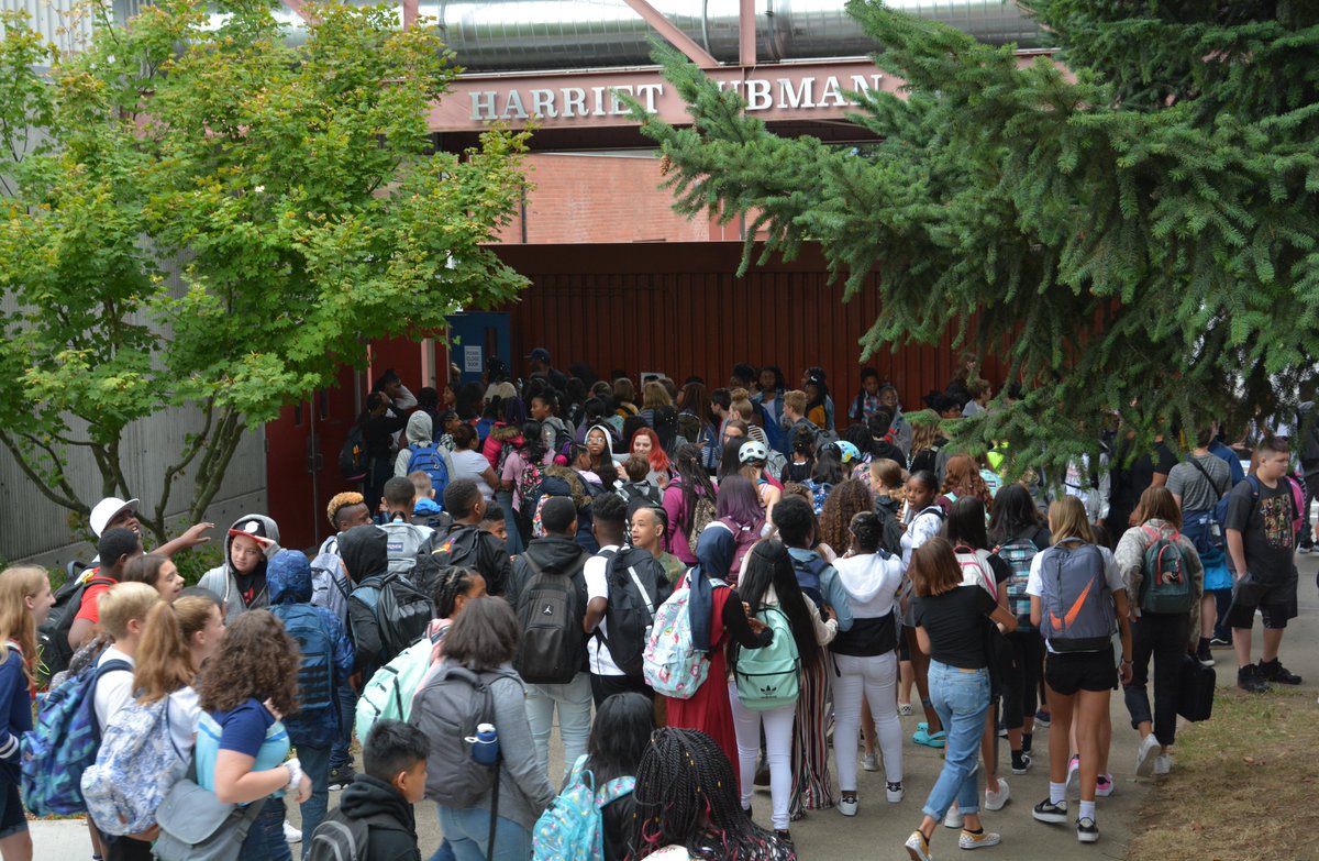 PPSConnect's tweet photo. Members of the Coalition of Black Men joined Harriet Tubman MS staff to welcome 7th and 8th graders to their first day of class. Thank you to our great community partners! #1DistrictPPS https://t.co/nq5FAo5Uds