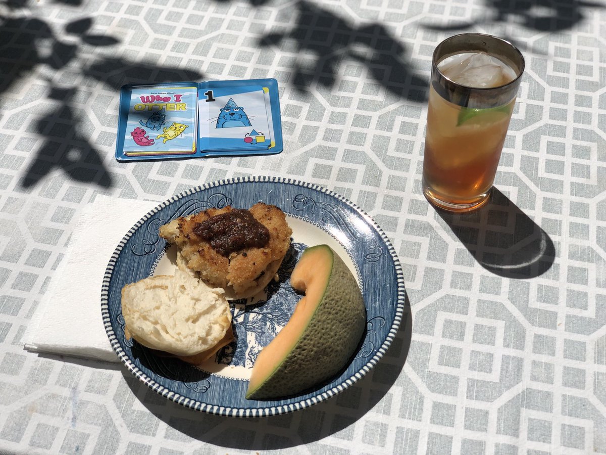 Caesar_X's tweet photo. But of a southern lunch outside today with a homemade fried chicken sandwich on biscuit, cantaloupe and sweet tea. While checking out my latest @buttonshy acquisition! #WhyIOtter https://t.co/9WY11ToCjO