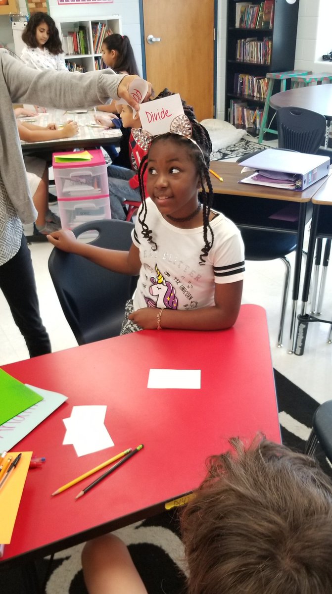 mrs_shoemake's tweet photo. Practicing our math stations! Math vocabulary headbands, flashcard war, and our fun whack a product! #mathstations #guidedmath #MichaelLegends https://t.co/GF5gdyZtFX