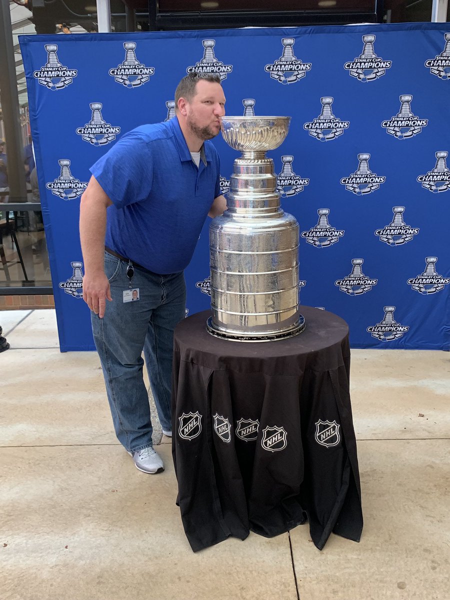 CarrieCMitchell's tweet photo. Don’t ever underestimate the power of a teacher 20 yrs later! A kid I taught in 1998 knew I desperately wanted Dan to get a visit with the cup. Mark Breitenstein ‘98 you rock! Dan and Mark met today and this happened!!! My @vianneygriffins are the best! Win for me! Win for Dan! https://t.co/XE7go002Z8