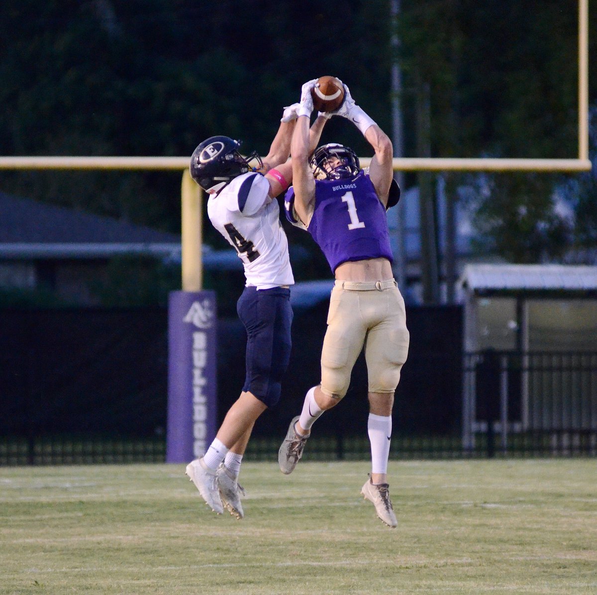 Ascension Catholic senior Brock Acosta leaps for an interception during Thursday's Jamboree at Floyd Boutte Memorial Stadium in Donaldsonville.