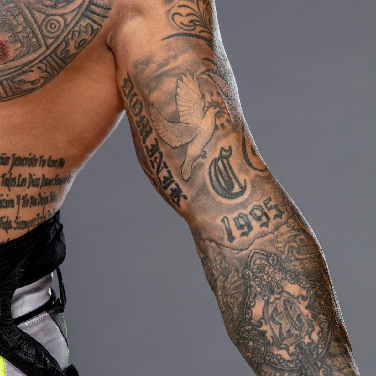 WWEIndia's tweet photo. Take a close look at @reymysterio's tattoos from #SuperstarInk: 
https://t.co/iVxoyIuH0o https://t.co/w77MFXvrJn