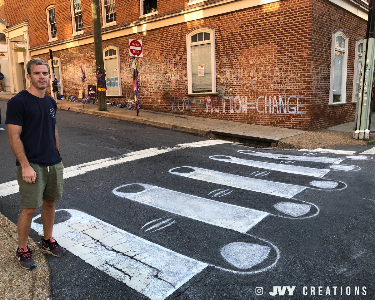 2 years ago this intersection in my hometown of Charlottesville became known for hate.  Last night I drew the crosswalk into a symbol of unity.