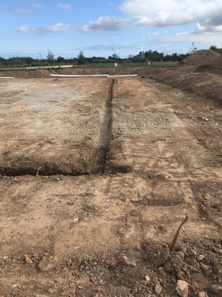 PST_Sport's tweet photo. Groundworks phase well underway at Gaelscoil Mhainistir Na Corann in Midleton, Co. Cork for a 1,500 sq/m 3G pitch with kerbing, fencing, netting, goal posts, ducting & bases for lighting & ball wall.
#YourPitchOurPassion
#CompleteTurnKeySolution https://t.co/PUfOIe6LtG