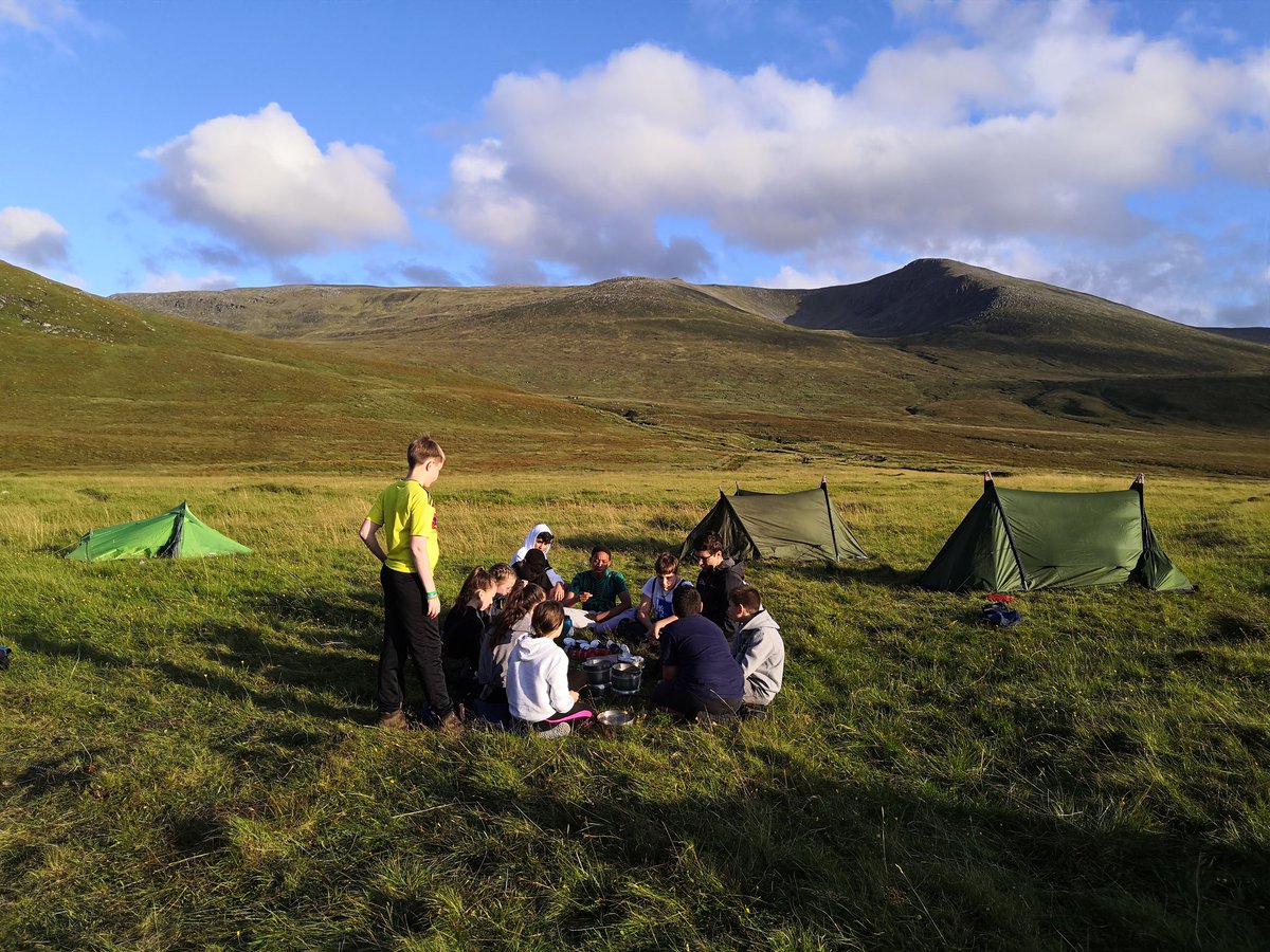 RacShe1001's tweet photo. Clan Stewart setting up camp and having a well earned dinner thanks to the fantastic instructor Seori. Sharing scary stories and singing round the stoves under a clear starry night was a highlight of the week for all of clan Stewart. @GracemountHigh @OutwardBoundUK https://t.co/PBLQ2KKkax