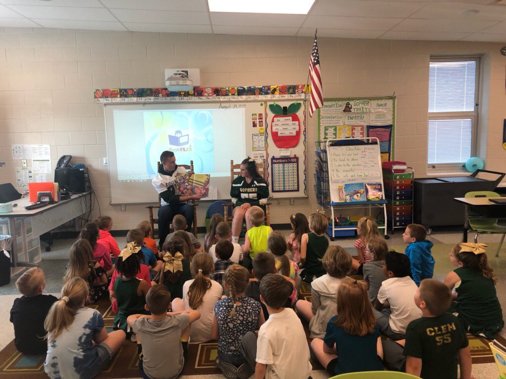 New tradition started! Football players &amp; cheerleaders go down to elementary in uniform on Fridays to read to younger kids! 

This is Gopher TE/DE Mason Stuck and Gopher Cheerleader Whitney Bailey reading to 2nd graders! More pics to come later today!  #OneRidgemont #RoleModels