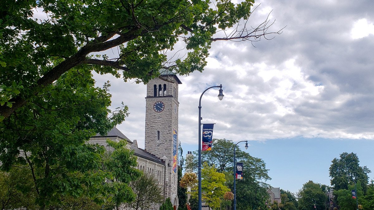 QueensComputing's tweet photo. #queensu is getting all decked out for our 50th year! Check out our new building sign on Goodwin Hall and banners down University Avenue. Just in time to welcome all the students back to @queensu campus next week. #QSC50 #queenscomputing https://t.co/fe98SFoMkF