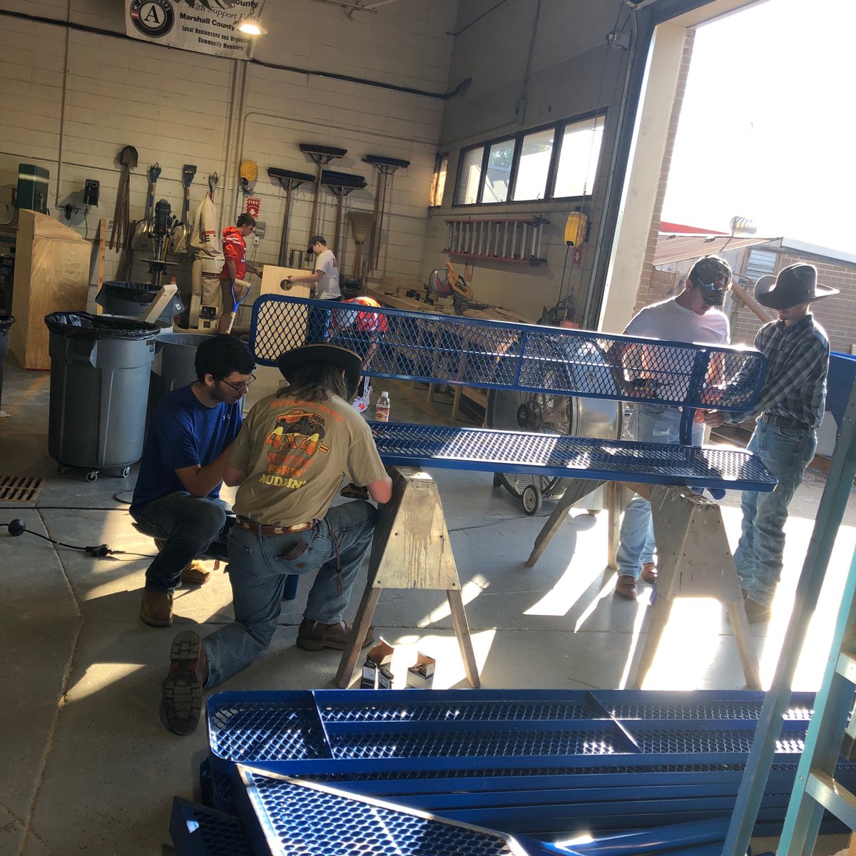 County1974's tweet photo. Carpentry students assembling benches for Central Elementary https://t.co/E9ivB6dSlU