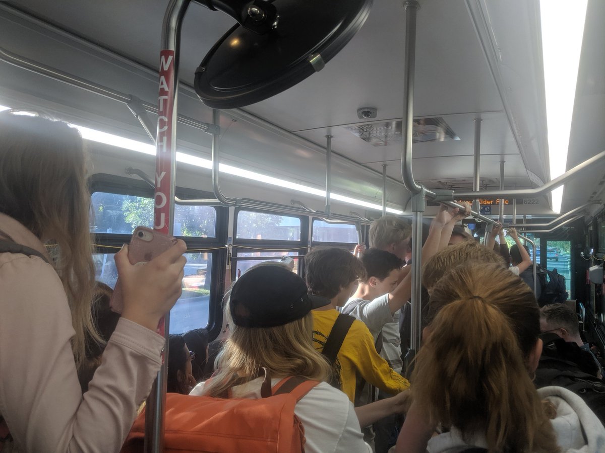 RTD bus full of students standing due to lack of space.