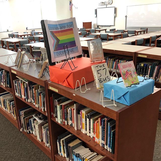 BiblioGrana's tweet photo. This display was FULL. :) Happy 1st week of school everyone. #chccslibraries #CHCCSLitCon #RepresentationMatters https://t.co/HLuy9J5Cbd https://t.co/pLMUOmUKrv