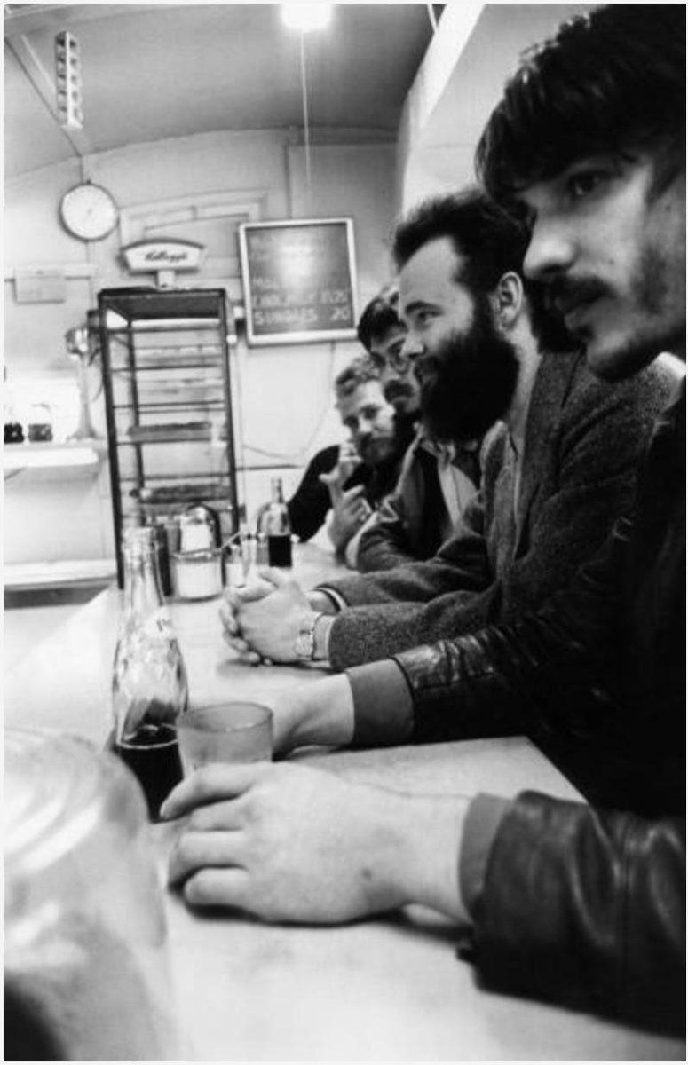 Elliott Landy's shot of The Band at a Woodstock diner: Levon Helm, Robbie Robertson, Garth Hudson, Rick Danko