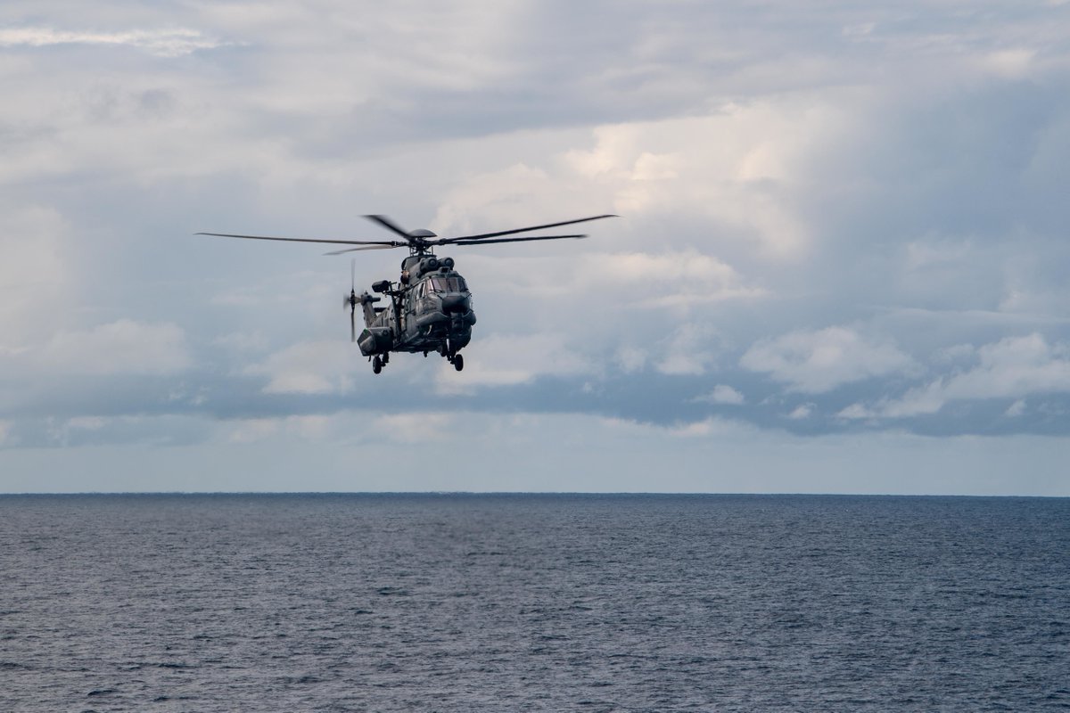 DeptofWar's tweet image. A Brazilian Navy Eurocopter EC 725 Super Cougar conducts flight operations  aboard the flight deck of th #USSCarterHall in support of  UNITAS LX (60). UNITAS, which means “unity” in Latin, has been held annually since 1960. #KnowYourMil