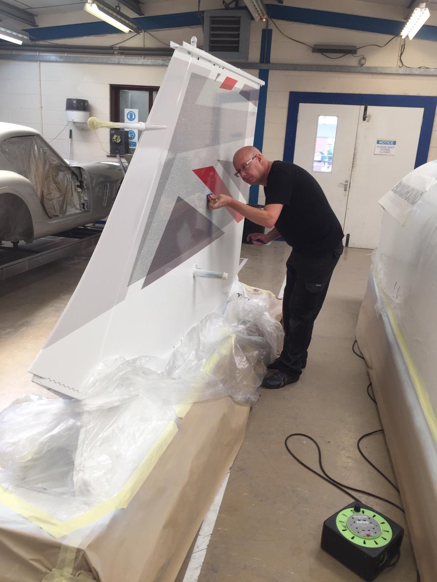 Bloodhound_LSR's tweet photo. Some 36,000 of you will be pleased to know all the names-on-the-fin were applied to to the freshly painted fin today. On Monday it will be covered in clear coat and baked, so they’re on there for high speed testing and beyond! #2019HST https://t.co/m5Pcuvzk7s