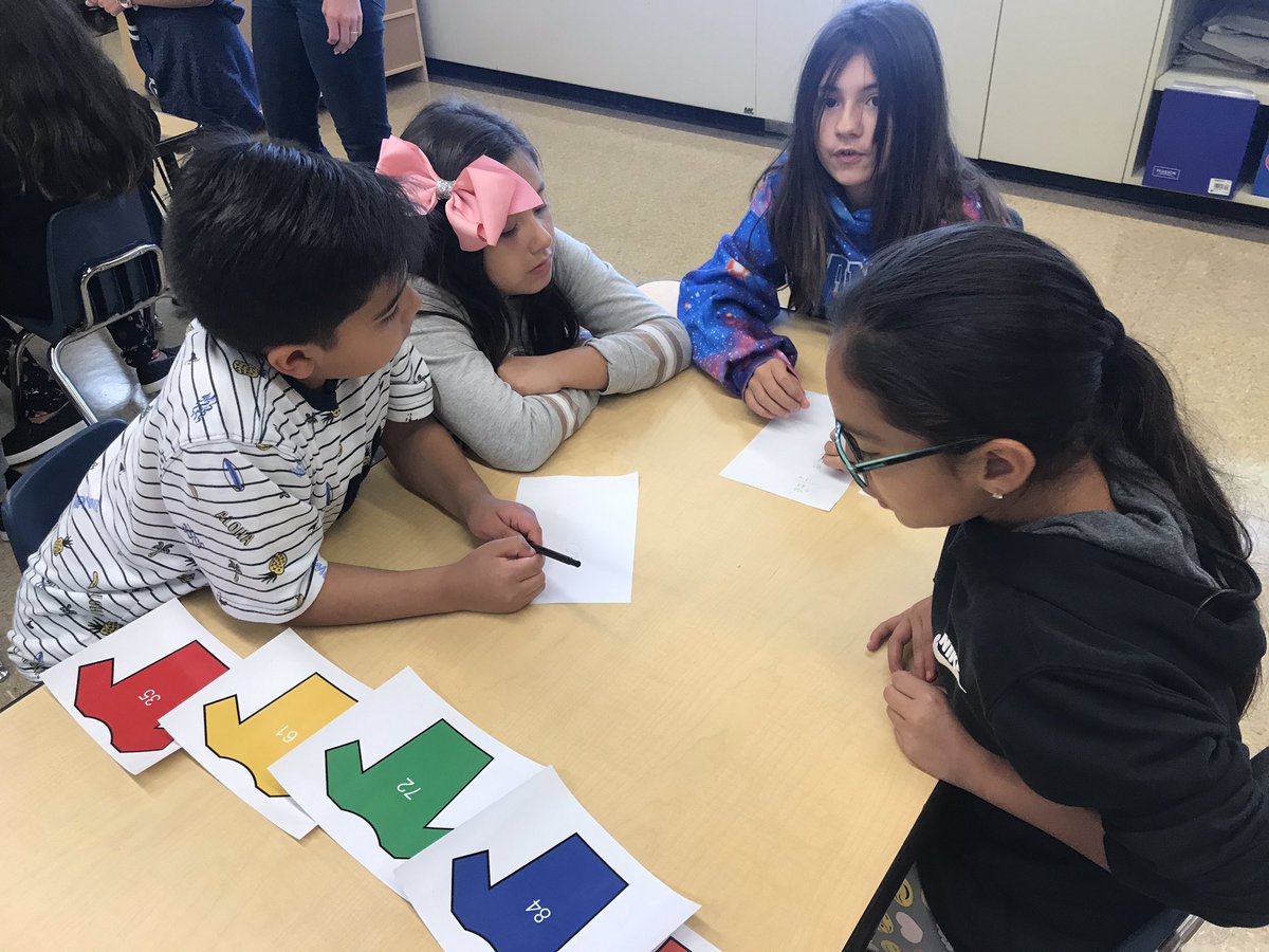 MrsAirdo's tweet photo. We love using BreakoutEDU!  We’re using team work and our place value skills to solve these puzzles.  #d84ontrack @D84North https://t.co/FcTVmPIQzp