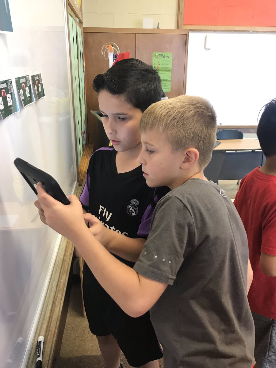 MrsAirdo's tweet photo. We love using BreakoutEDU!  We’re using team work and our place value skills to solve these puzzles.  #d84ontrack @D84North https://t.co/FcTVmPIQzp