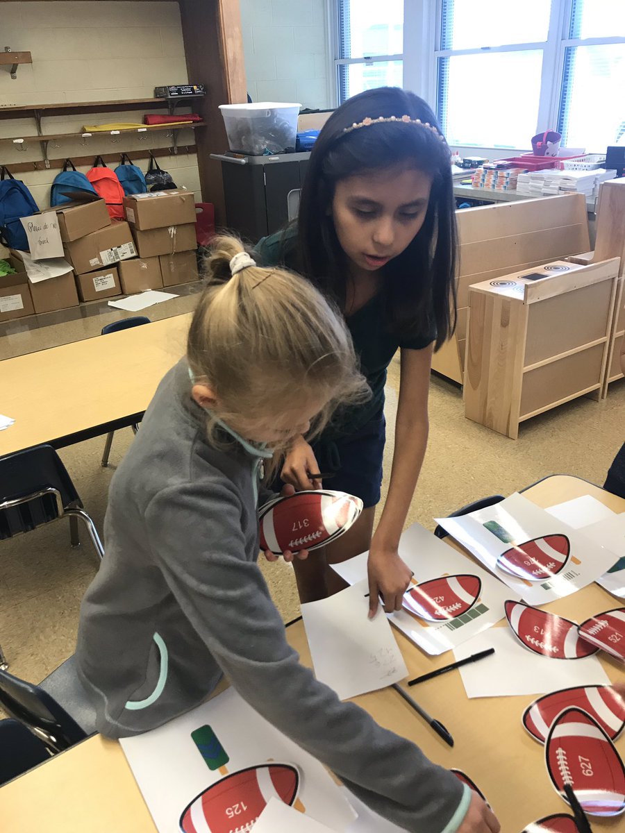 MrsAirdo's tweet photo. We love using BreakoutEDU!  We’re using team work and our place value skills to solve these puzzles.  #d84ontrack @D84North https://t.co/FcTVmPIQzp