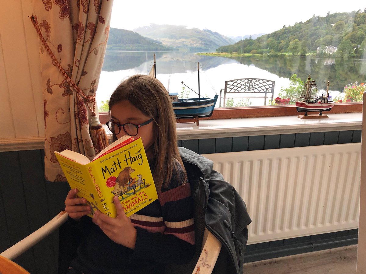Evie enjoying her favourite book before tea overlooking Loch Sunart in the Scottish Highlands ⁦@matthaig1⁩ ⁦@Sophrosyne_1⁩