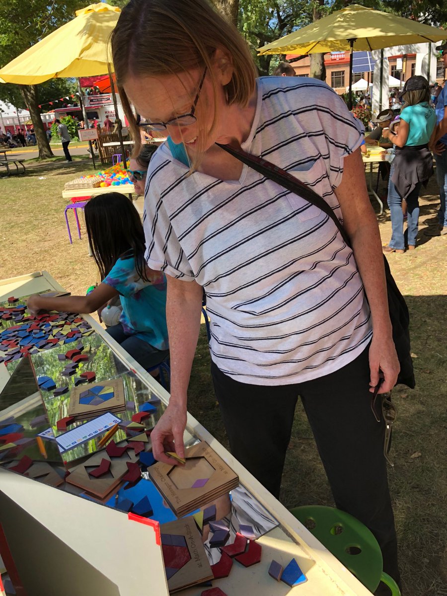 maggieleemchugh's tweet photo. We finally made it! Math at the MN State Fair! #mathonastick @Trianglemancsd @jennkosiak @WIMathCouncil https://t.co/0ewGpKsYcV