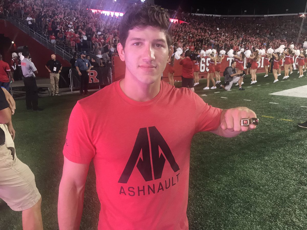 RUWrestling's tweet photo. .@AnthonyAshnault rocking his NCAA title ring on the @RFootball sideline.

#RelentlessPursuit | #GoRU https://t.co/7qI2ZduzhE