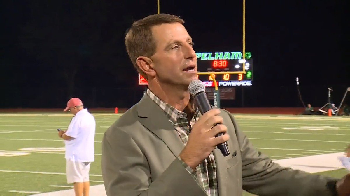 Clemson coach Dabo Swinney speaking after having his football jersey