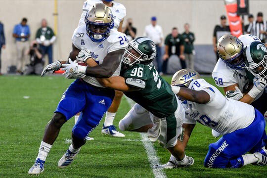 CFBKings's tweet photo. Tulsa was held to -73 rushing yards tonight by #18 Michigan State.

They passed for 153 yards, bringing their total to 80, however also had 8 penalties totaling -80 yards.

Tulsa net gained 0 yards tonight. https://t.co/FVJtiVJRRN