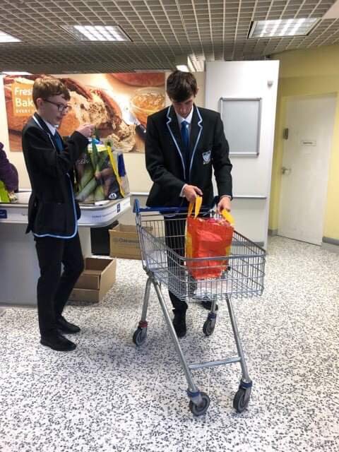 Uganda2018_MHS's tweet photo. Today we’re packing bags @TescoMonifieth to raise funds for our charity trip to Uganda with @signpostintl and @MonifiethHigh #community #globalcitizens https://t.co/78Fv9qMgOV