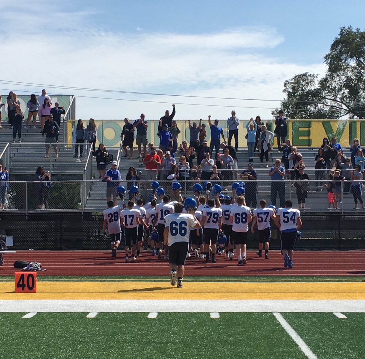 A helmet salute after a win is one of my favorite traditions. Congrats to the freshman on their first high school win! #lznation