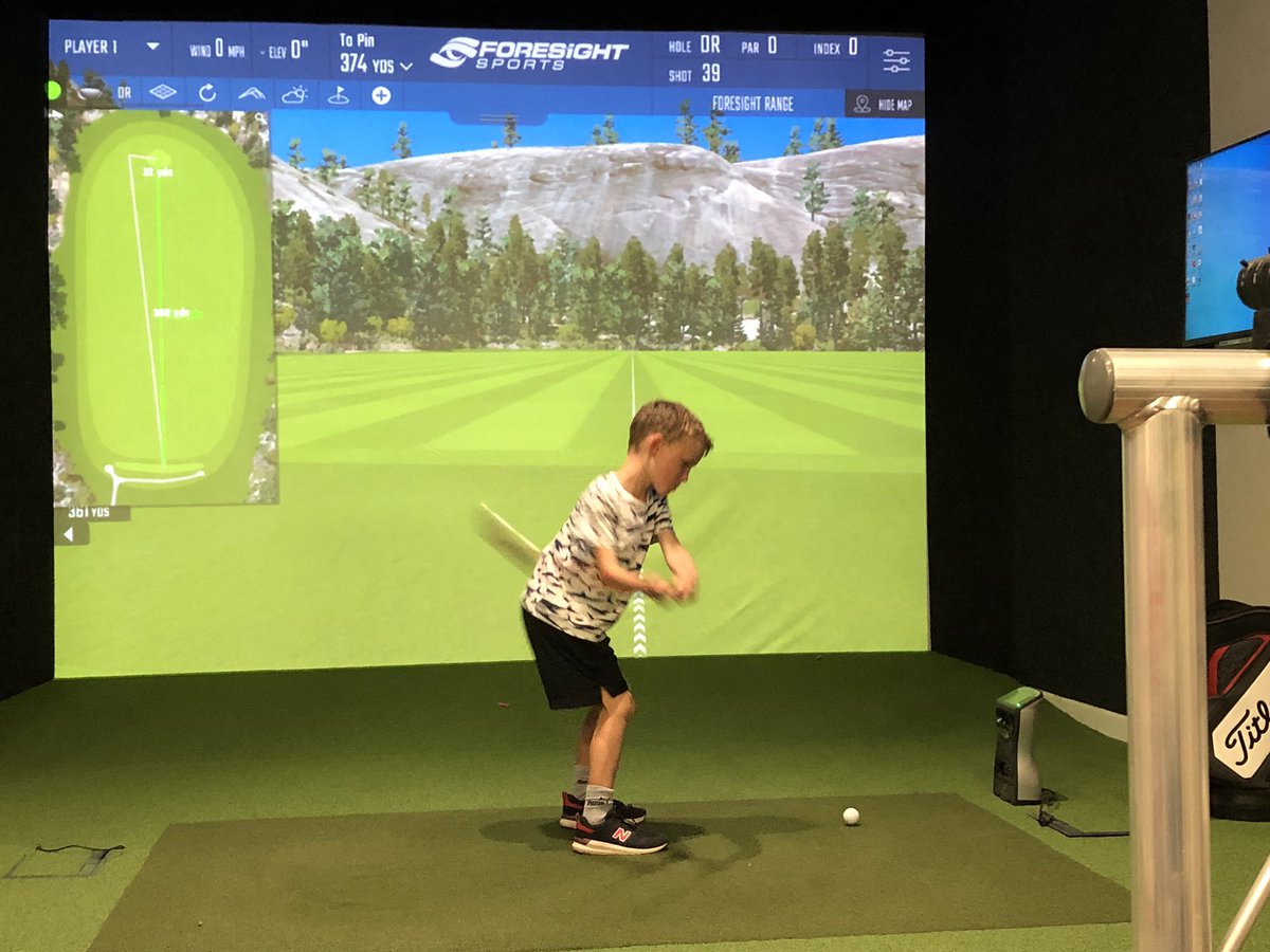 WokingGolf's tweet photo. Cheeky session of indoor family foursomes, in @WokingGolfPro’s fantastic swing studio @WokingGolf #startyoung #beatdaddy https://t.co/KevGgRFgb1