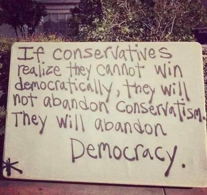 Sign says that conservatives who can't win democratically don't abandon conservatism but democracy