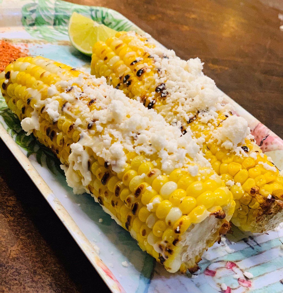 MyCompadresMex's tweet photo. Haven’t tried our corn on the cob? Well come in today! Have some delicious grilled corn topped with mayo, Mexican cheese with a side of tajin (a Mexican spice with a unique blend of chili, lime and sea salt) and a lime wedge. https://t.co/xqDdO7qsGk