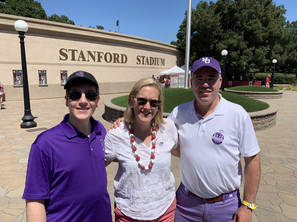 NancyRotering's tweet photo. Today, our house is divided! Yes, the kid on the left is wearing @StanfordFball shorts. #FearTheTree #GoB1GCats @NUFBFamily https://t.co/hMOiROUjeo