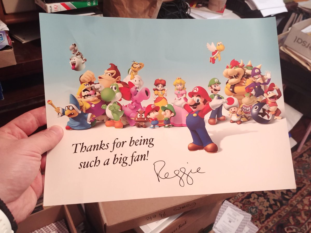 The absolute ace of the find, though, is this poster hand-signed by  @Reggie. He really appreciated my efforts as a Nintendo fan.