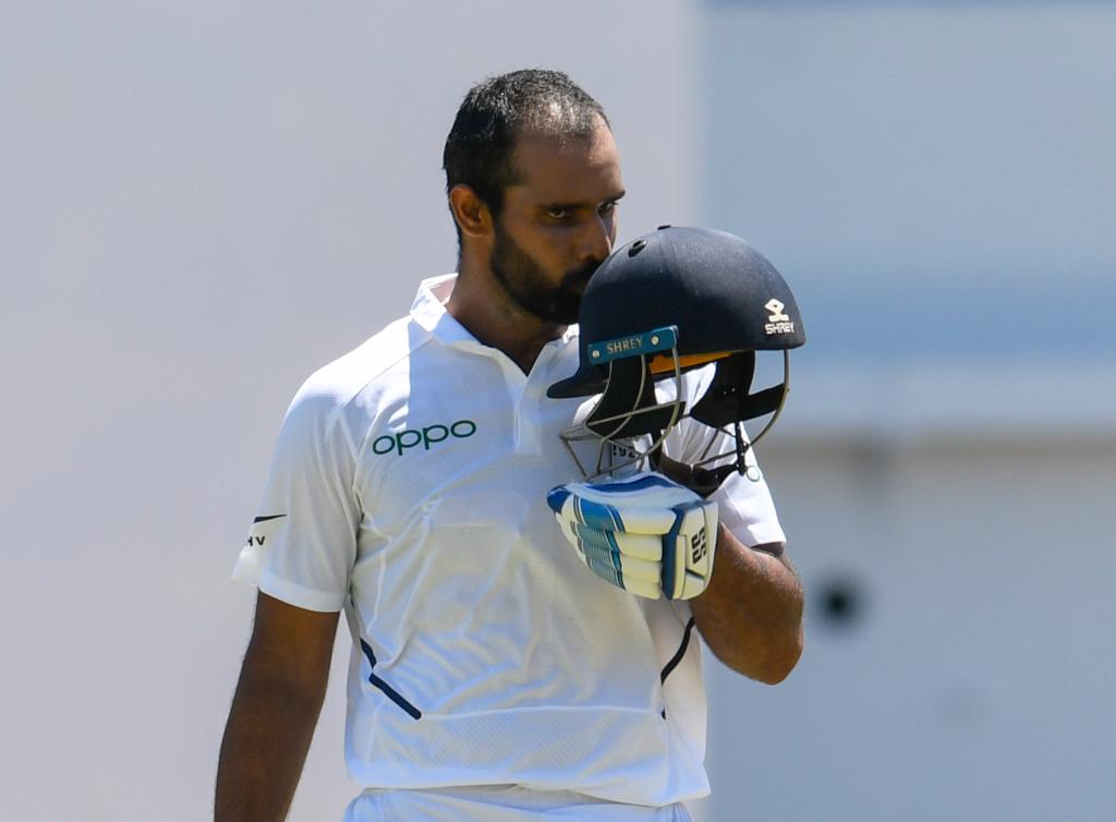 ICC's tweet photo. End of the India innings!

They are bowled out for 416 with Hanuma Vihari top scoring with 111, his maiden Test century 👏 

Jason Holder took five wickets for West Indies. https://t.co/dEpgOu7zlY