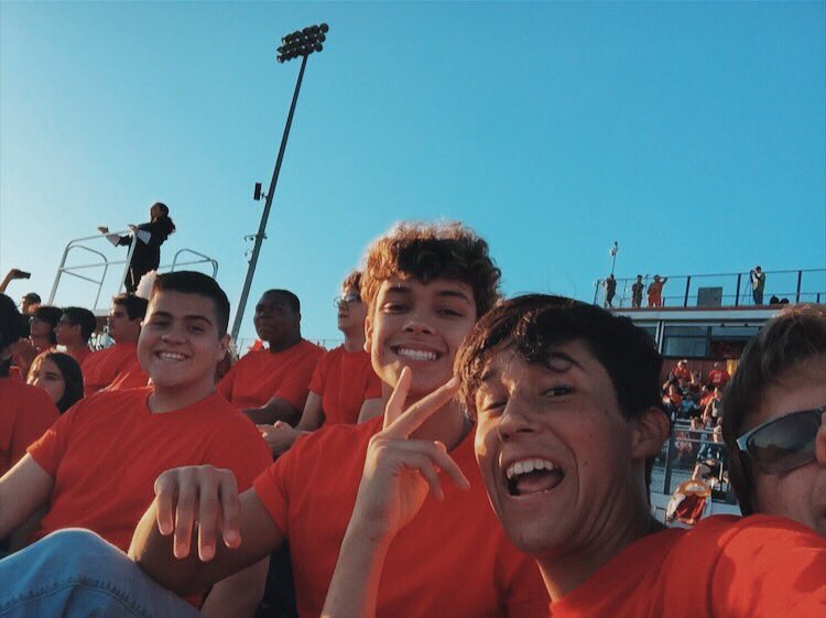chsmadrigals1's tweet photo. some shots of our mads on the field before singing the National Anthem at yesterday’s football game! https://t.co/VIM6Dc4Apz
