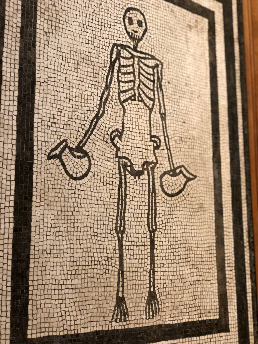 OptimoPrincipi's tweet photo. Roman mosaic showing a grinning skeleton holding a wine jug in each hand. Once decorating a dining room floor, its message was entirely appropriate to the Romans and no-doubt inspired lively discussion: "Carpe Diem" and enjoy the delights of the banquet while you can. 1st cent AD https://t.co/wqTCzENbmI