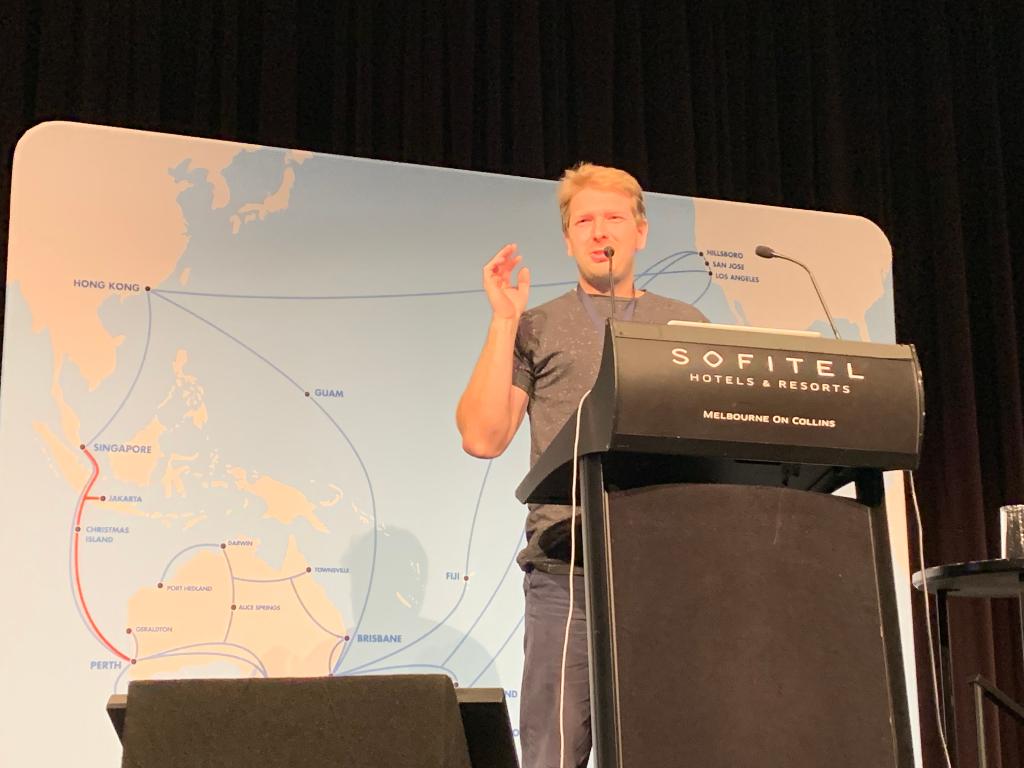 CiscoANZ's tweet photo. #Cisco’s Aleksandr Karavanin took centre stage at #AusNOG 2019 addressing a very relevant topic among Australian Digital Service Providers (DSP). Learn more on #SR and #SRv6 innovations and adoptions: https://t.co/KknJqU4pKr and https://t.co/Kl1JoO3IoY https://t.co/iAb4qOqCKl
