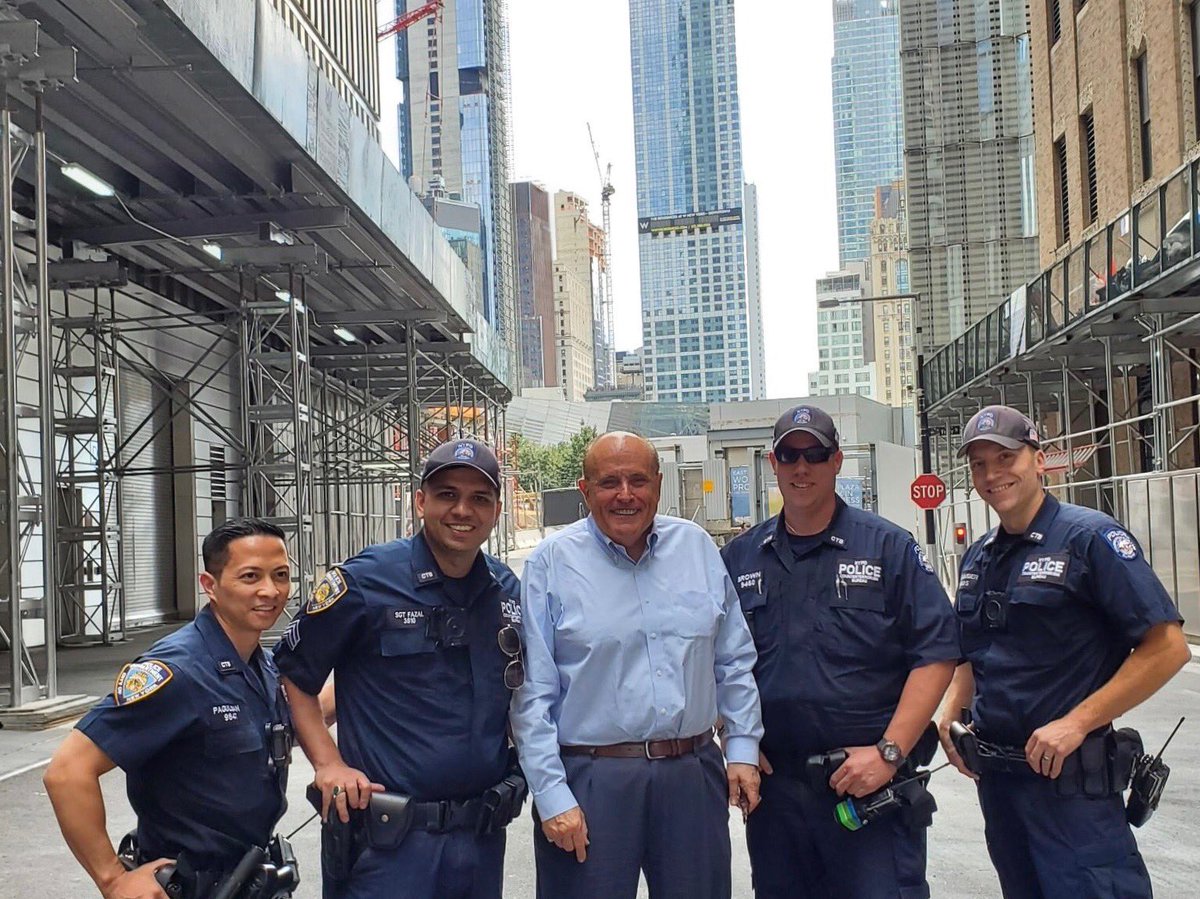 NYPDCT's tweet photo. This afternoon, our officers were pleased to have met former #NYC Mayor @RudyGiuliani. The honorable mayor stepped out of his vehicle for a picture while passing through a checkpoint going to the 9/11 museum. While paying tribute to the fallen, he shows support for #NYPD. https://t.co/AhJAxjMzZF