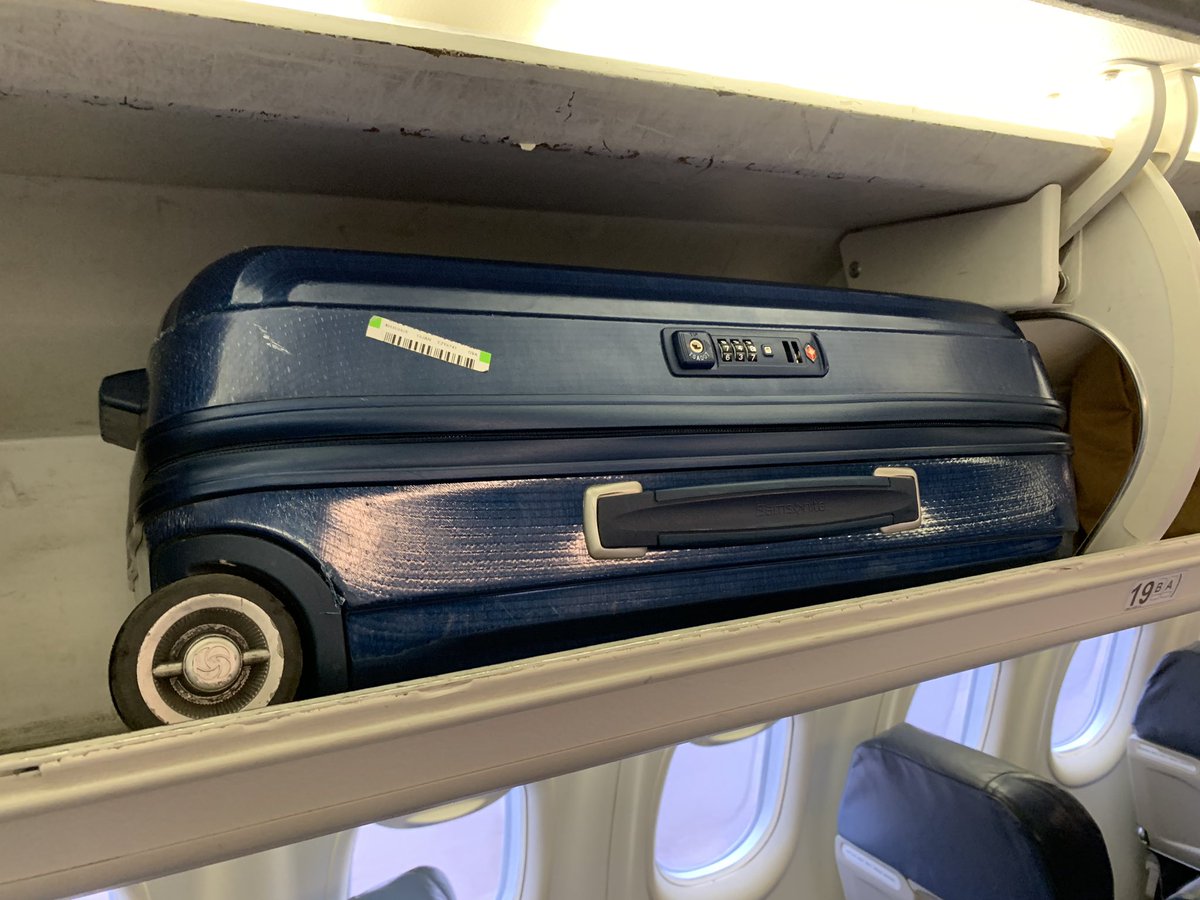 Jtni's tweet photo. @flybe @BELFASTCITY_AIR I 100% support rules for baggage size. My bag is your designated dimensions. Fits nicely in your overhead bins. Yet your gauge ripped it to shreds. I’m furious. 
Stop trying to get an extra £35. That’s all you are doing. And you know it. https://t.co/PDs5AlKwRM