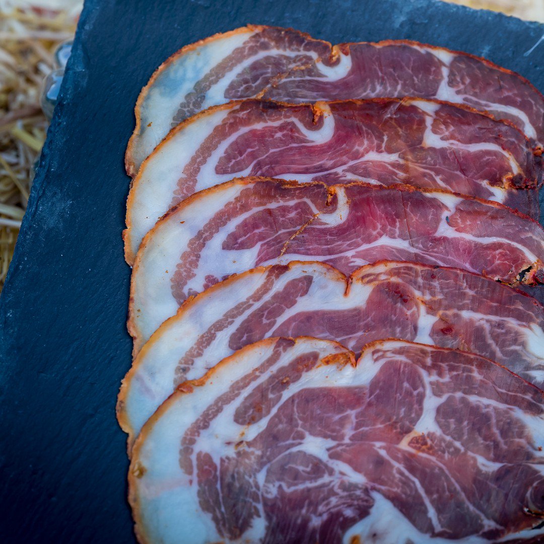 Charcuterie_AW's tweet photo. Do you know what Coppa is? It's a traditional Italian ham made from the dry-cured muscle running from the neck to the 4th/5th rib of the pork shoulder/neck. Featured is a Gold Medal &amp; Best in Class British example from Melton Charcuterie. #britishcharcuterie #charcuterie https://t.co/9m0x7TL4eq