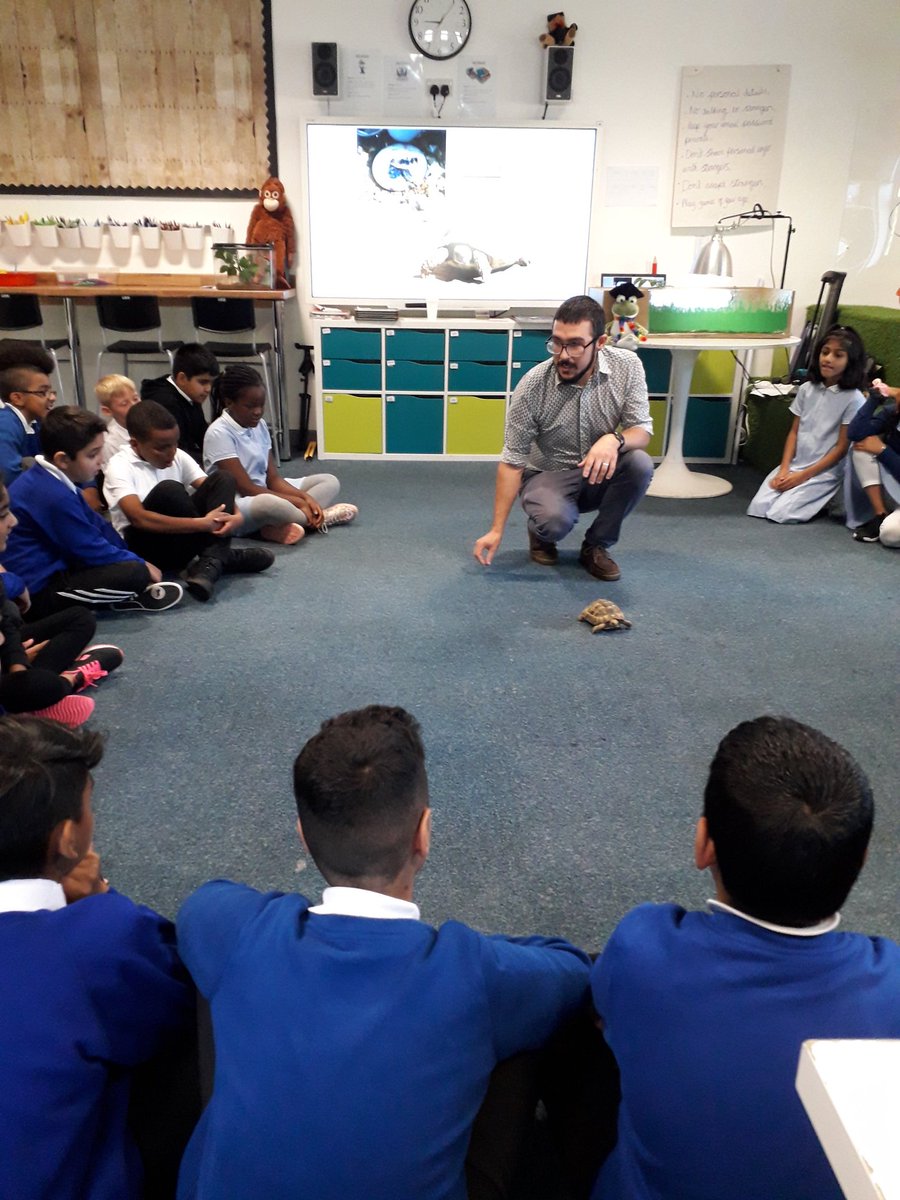 Rowlatts_TMET's tweet photo. Group 3 and Professor Meady are having a great time meeting our school pets this morning during zoo lab day! Esio and the new Stick Insects are so interesting. #curiosity #rhscience #excitement #engagement #professormeady https://t.co/snWE1xpbLN