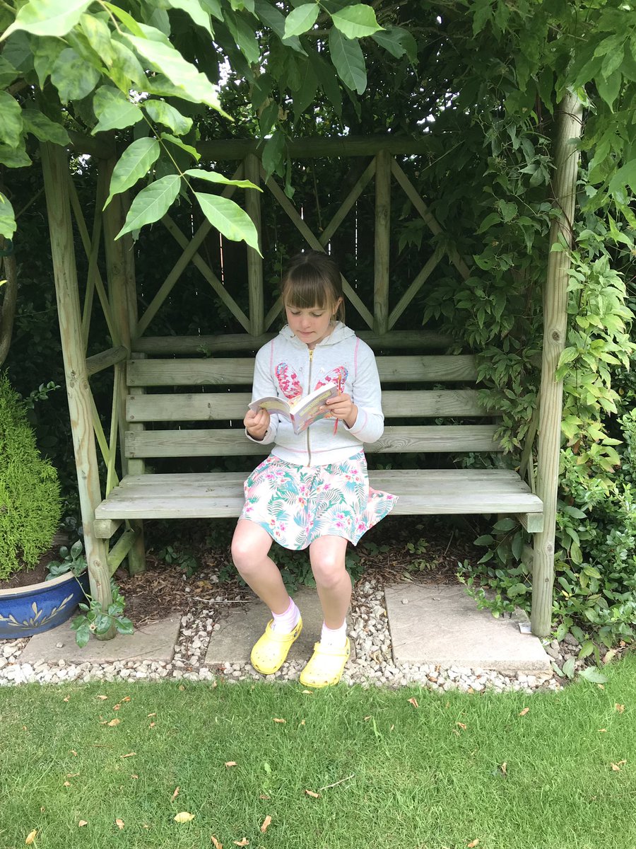 HelksVicky's tweet photo. #MNASummerReadingBingo  reading in the garden https://t.co/duYlGbAZ4m