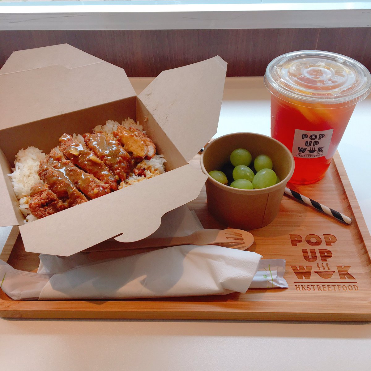 No more #bluemonday ! Lunch special <a href="/popupwok/">Pop Up Wok</a> - fried chicken cutlet with rice. Can go with or without #curry sauce 🤤 Also served with #fruit or #salad 🌱 Btw, there is a small showcase about #hongkong at Multi-Language Library above the brownie‘s bar at Eldon Garden.