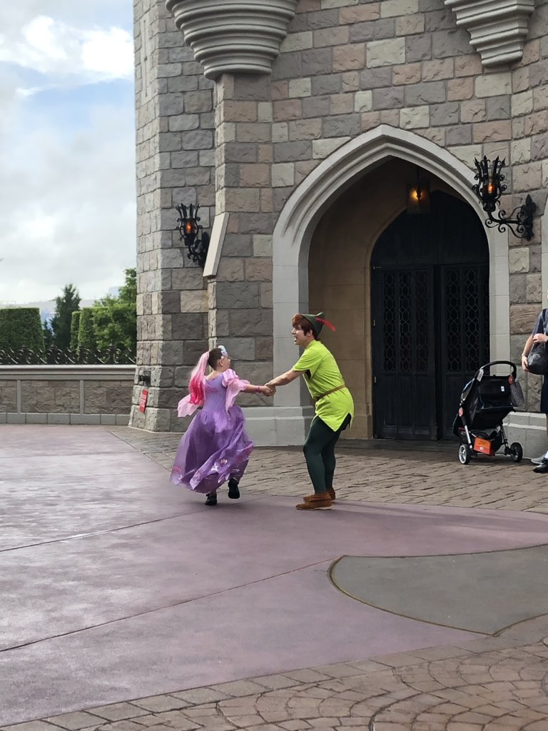 LilDisFan's tweet photo. OMG, #PeterPan is playing hide and go seek with kids in Fantasyland, how to pull the sword from the stone and showing them how to catch rain water...IT IS SO FREAKING INCREDIBLE.  #MagicKingdom #stillmagical https://t.co/HklAF3R687