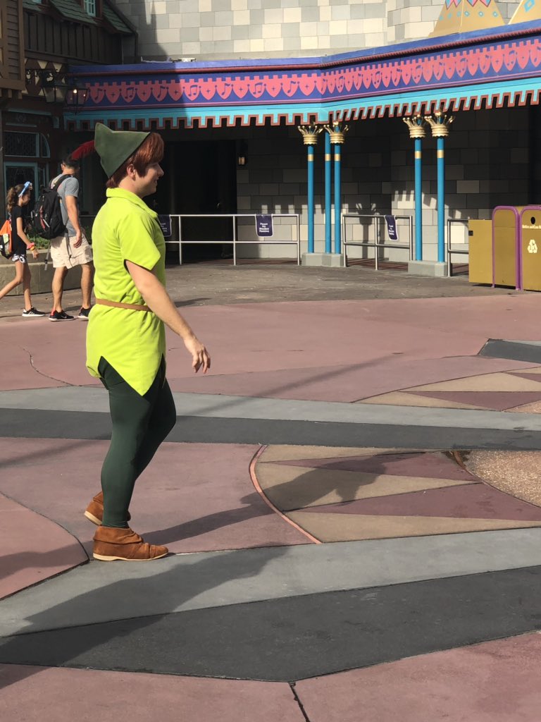 LilDisFan's tweet photo. OMG, #PeterPan is playing hide and go seek with kids in Fantasyland, how to pull the sword from the stone and showing them how to catch rain water...IT IS SO FREAKING INCREDIBLE.  #MagicKingdom #stillmagical https://t.co/HklAF3R687