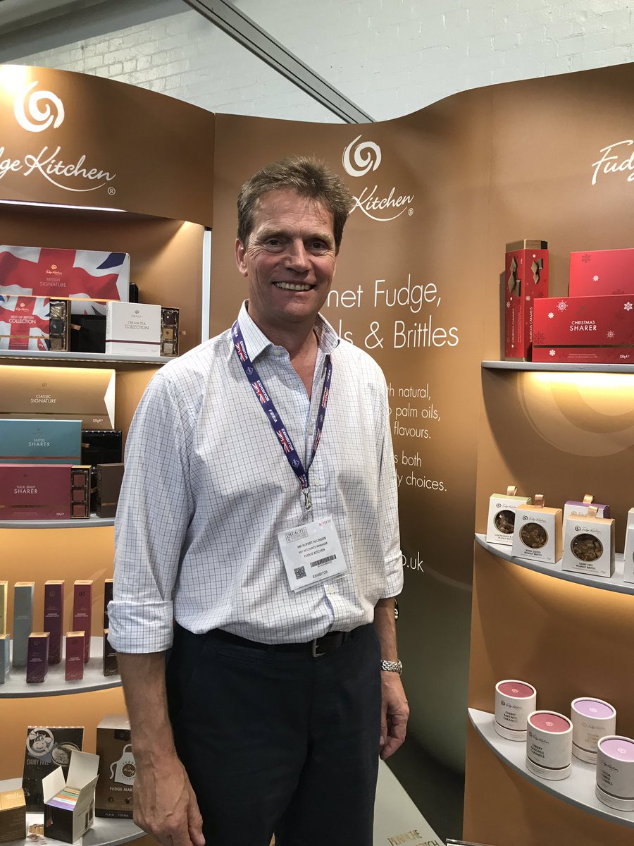fudgekitchen's tweet photo. What do you think of our gorgeous new stand @SpecialityFair? Beautifully modelled by Our Rupert and acres of handmade premium #confectuonery in stunning new #gift packaging. #fudge, #brittles, #caramels, #drinkingfudge, #ownlabel, #bespoke ... https://t.co/tzEtBkCy0h