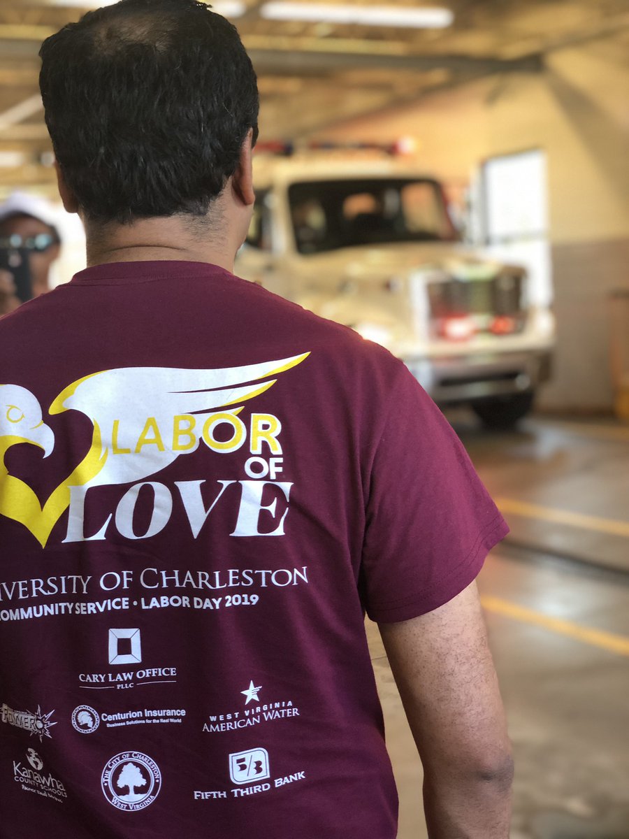 fxithann's tweet photo. #UClaborday washing fire trucks for labor of love. UC is always giving back to the community! https://t.co/eZpSDkAkQD