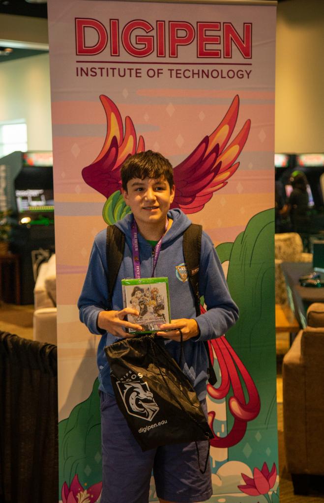 LenovoLegion's tweet photo. All weekend long, the DigiPen Institute of Technology has been rewarding @pax West visitors beyond their pioneering program in video game technology and development.
Give the daily @DigiPenDragons winners a hand! 👏 👏 👏
#DigiPenArcade #DigiPen
#PAXWest #LegionPAX https://t.co/7fzrgD5rEq