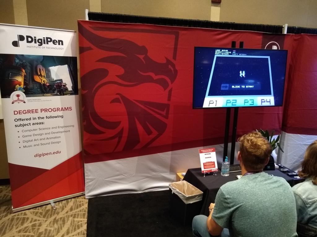 LenovoLegion's tweet photo. All weekend long, the DigiPen Institute of Technology has been rewarding @pax West visitors beyond their pioneering program in video game technology and development.
Give the daily @DigiPenDragons winners a hand! 👏 👏 👏
#DigiPenArcade #DigiPen
#PAXWest #LegionPAX https://t.co/7fzrgD5rEq