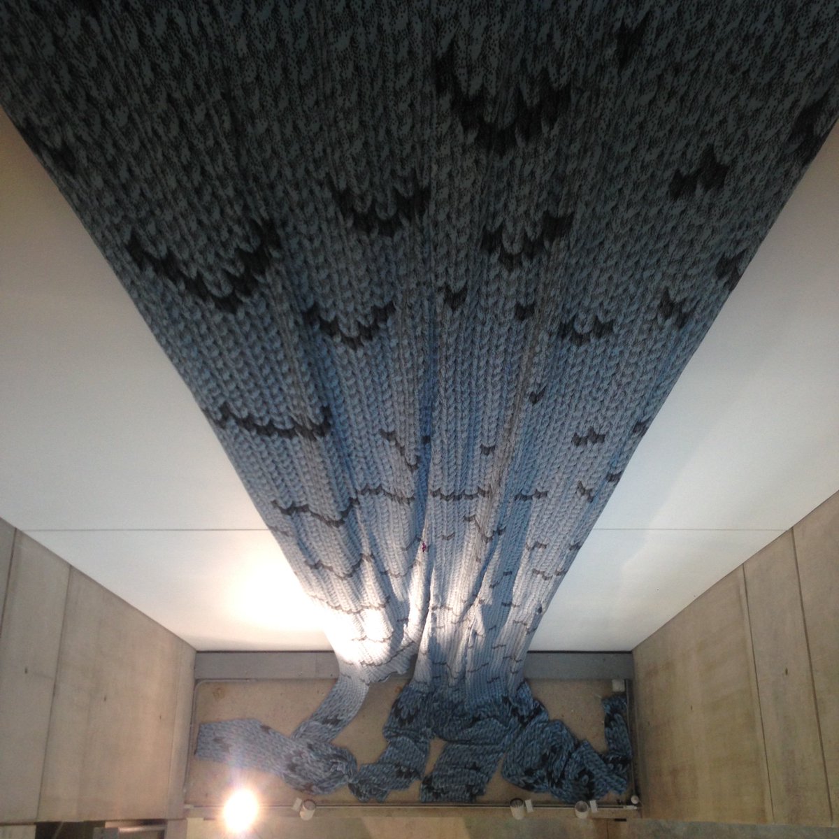 videosmithery's tweet image. a 16 metre meta knit of giant  stitches to create a knitted waterfall. Proud to have it displayed in @McrSchArt as part of the #RadicalResponse exhibit for @IASDR2019